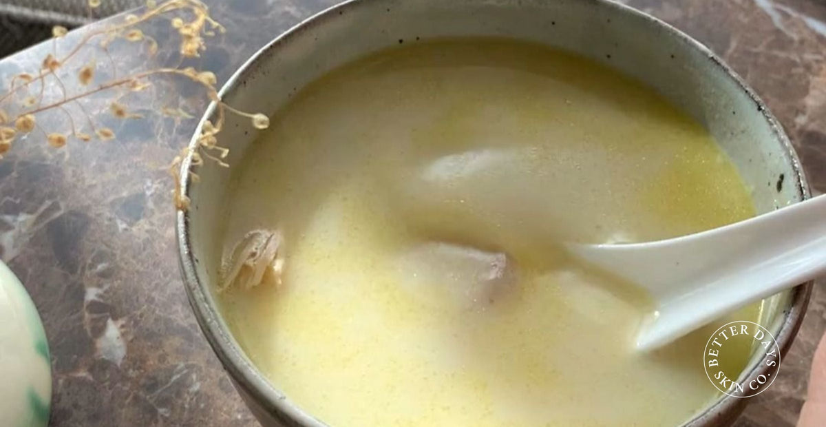 A comforting TCM  Sea Coconut Chicken soup that features tender chicken, rich pork bones, and the creamy goodness of coconut milk, enhanced by the sweetness of carrots, Chinese red dates, and the umami of dried scallops.