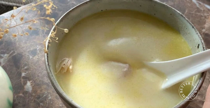 A comforting TCM  Sea Coconut Chicken soup that features tender chicken, rich pork bones, and the creamy goodness of coconut milk, enhanced by the sweetness of carrots, Chinese red dates, and the umami of dried scallops.